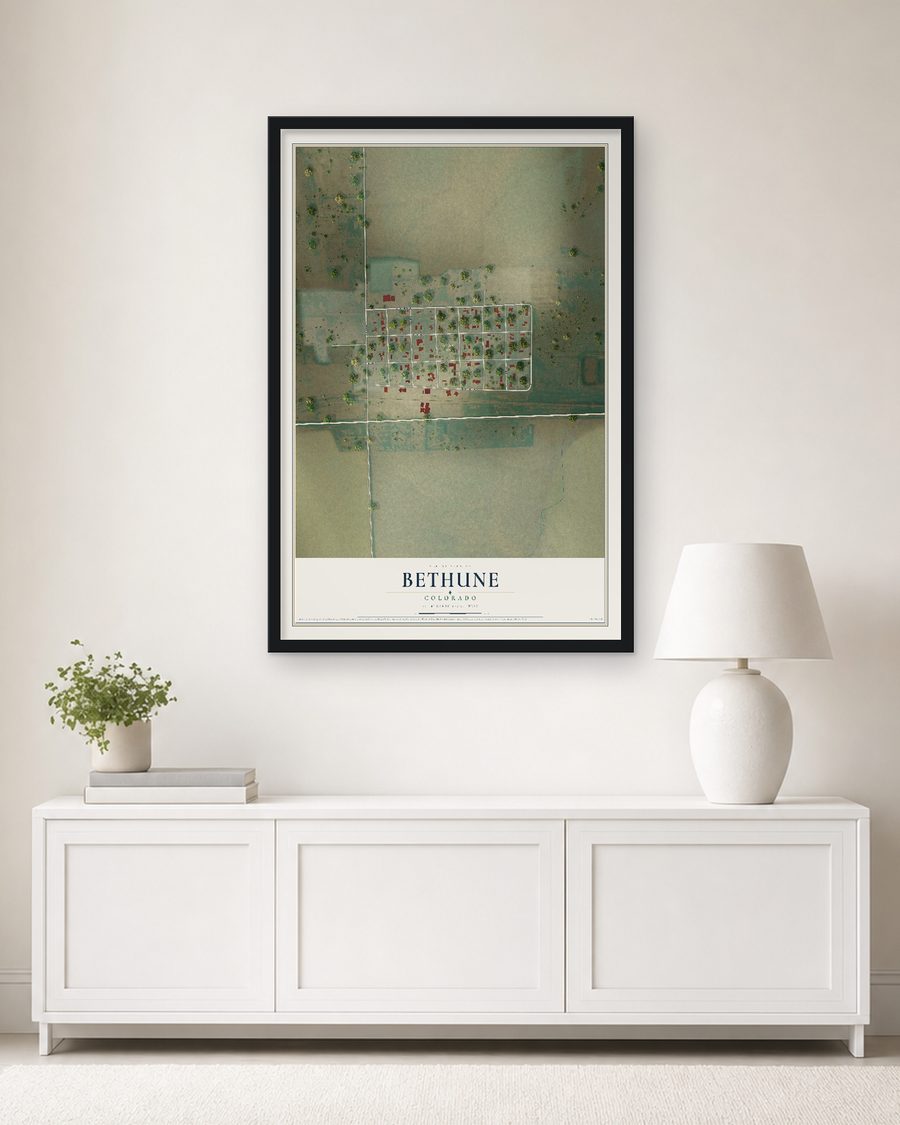 The Bethune, Colorado map, 24 x 36 in, in a black wood frame on a living room wall