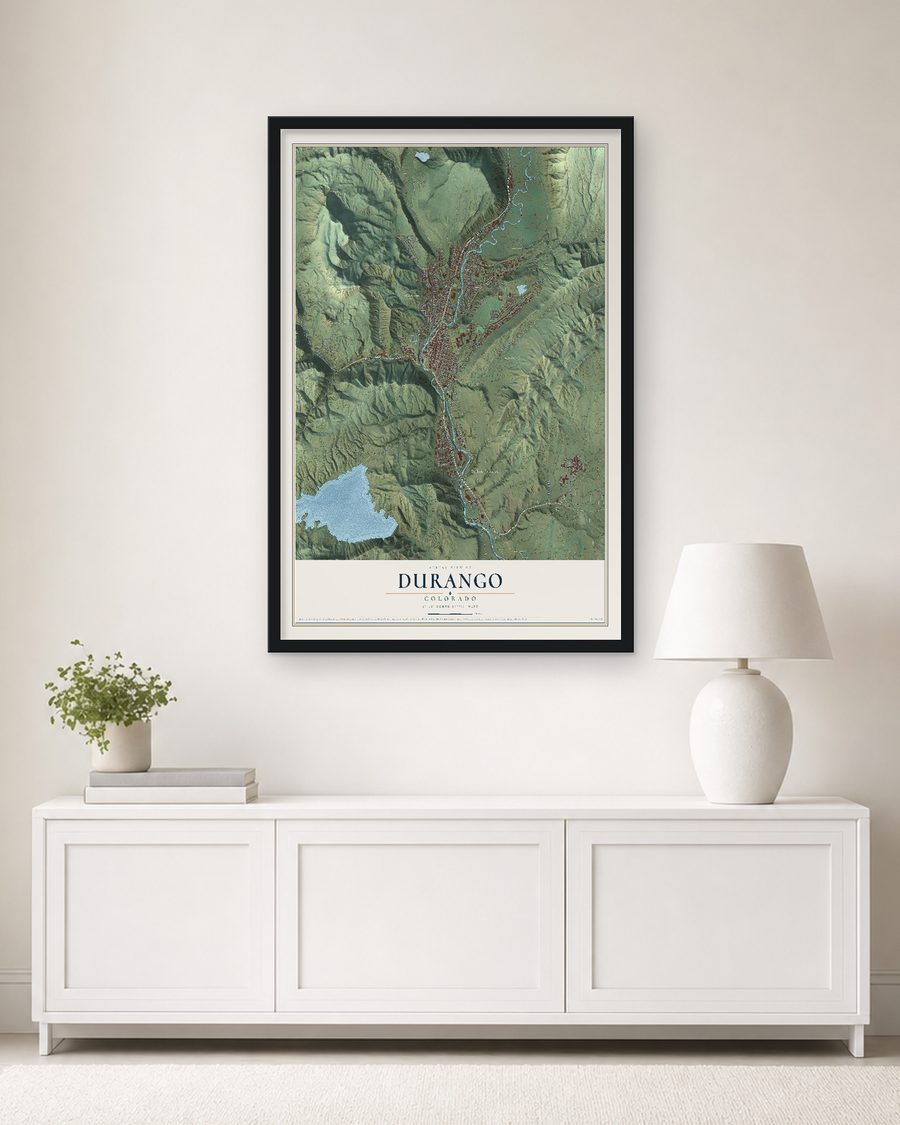 The Durango, Colorado map, 24 x 36 in, in a black wood frame on a living room wall