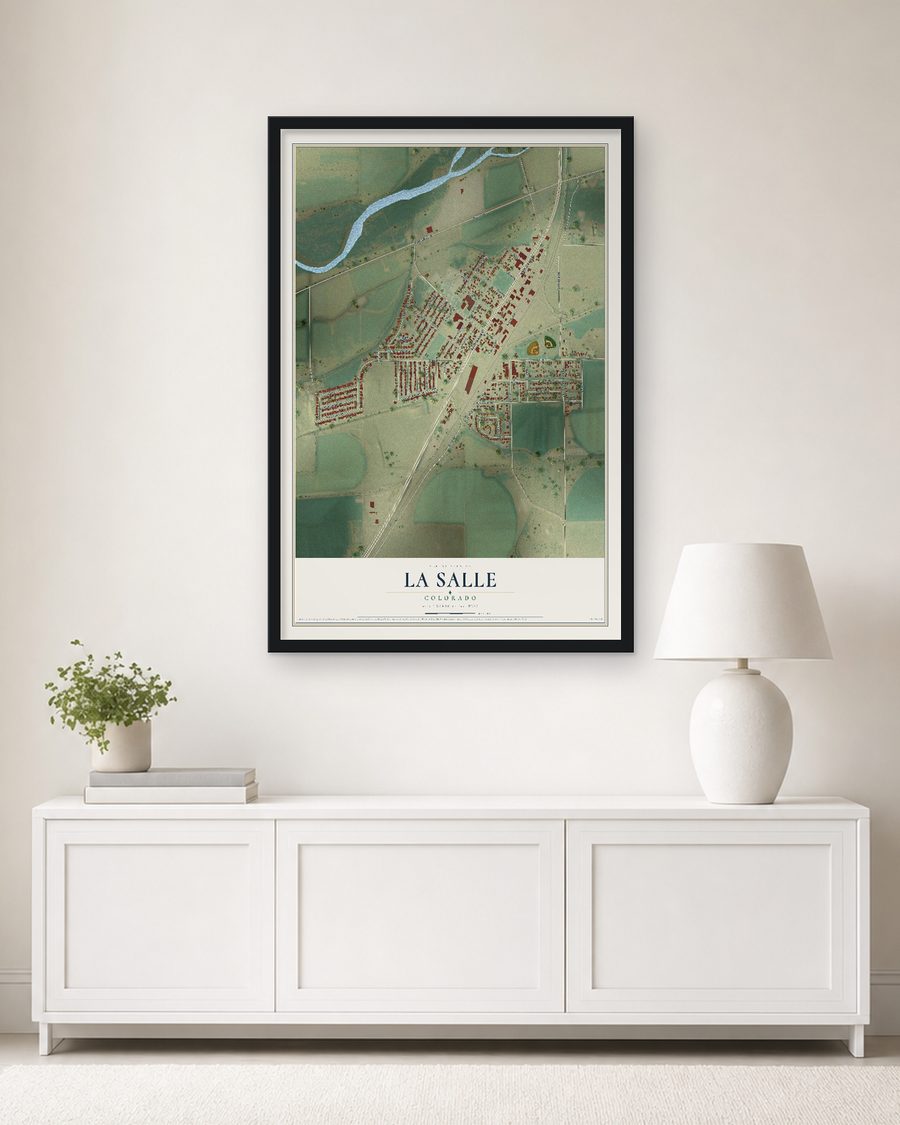 The La Salle, Colorado map, 24 x 36 in, in a black wood frame on a living room wall