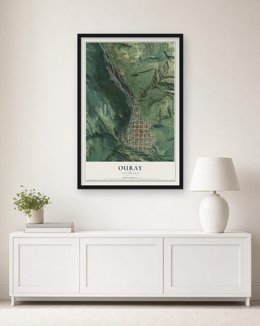 The Ouray, Colorado map, 24 x 36 in, in a black wood frame on a living room wall