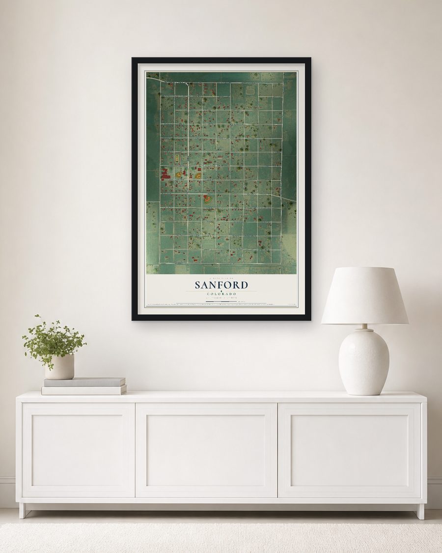 The Sanford, Colorado map, 24 x 36 in, in a black wood frame on a living room wall