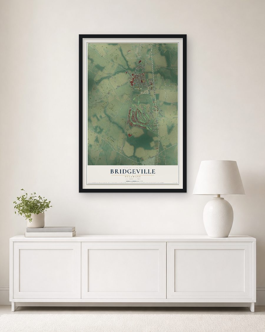 The Bridgeville, Delaware map, 24 x 36 in, in a black wood frame on a living room wall