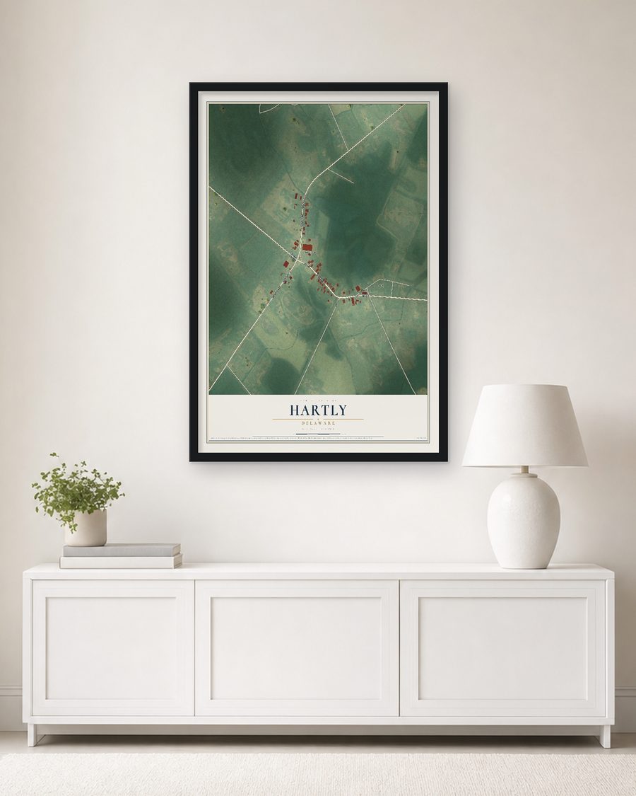 The Hartly, Delaware map, 24 x 36 in, in a black wood frame on a living room wall
