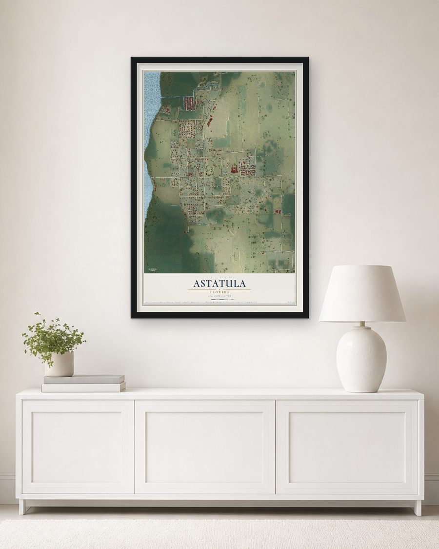 The Astatula, Florida map, 24 x 36 in, in a black wood frame on a living room wall