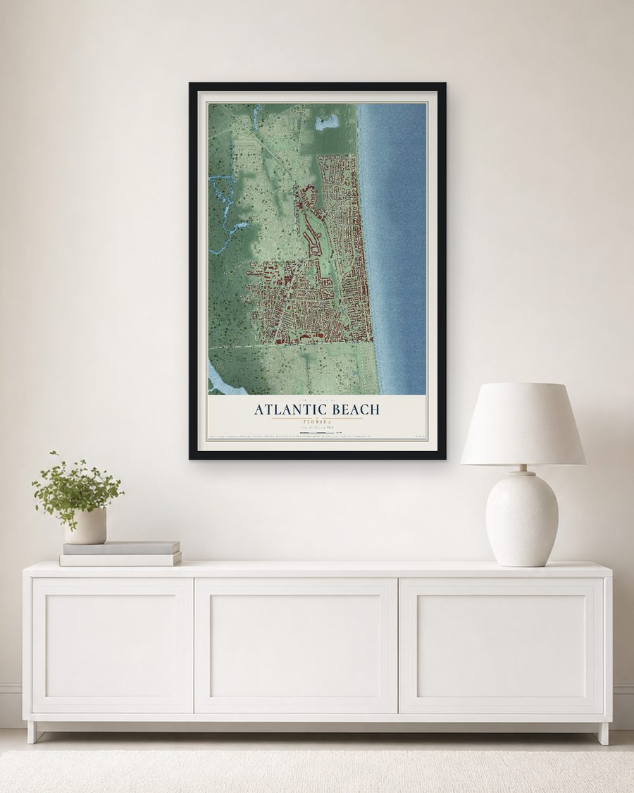 The Atlantic Beach, Florida map, 24 x 36 in, in a black wood frame on a living room wall