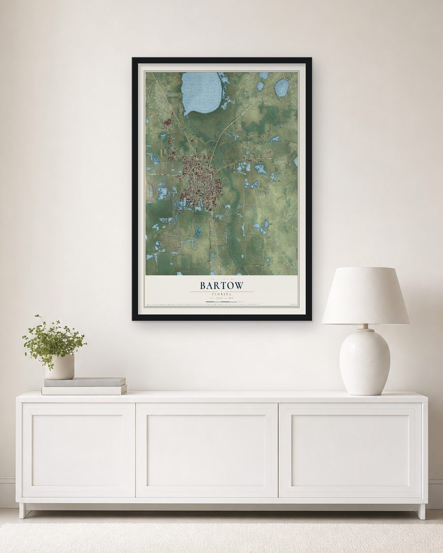 The Bartow, Florida map, 24 x 36 in, in a black wood frame on a living room wall
