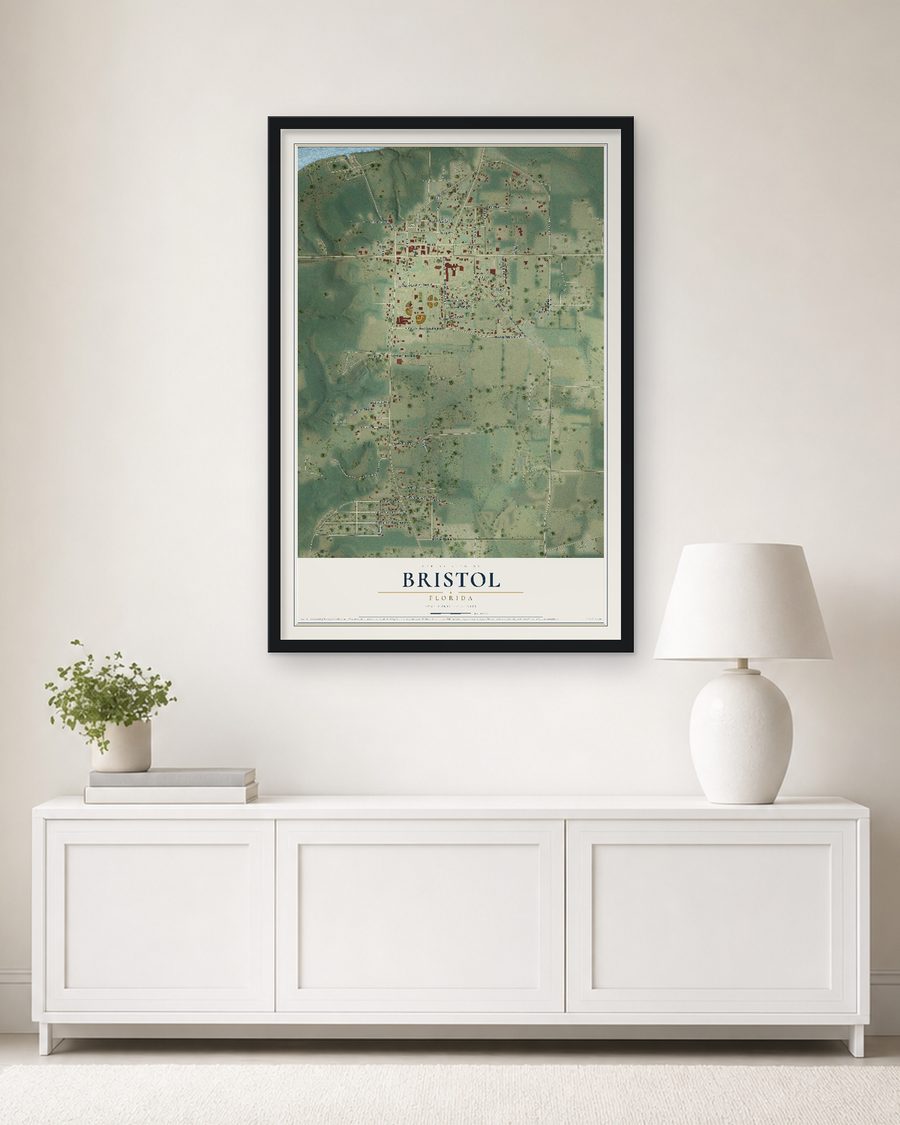 The Bristol, Florida map, 24 x 36 in, in a black wood frame on a living room wall