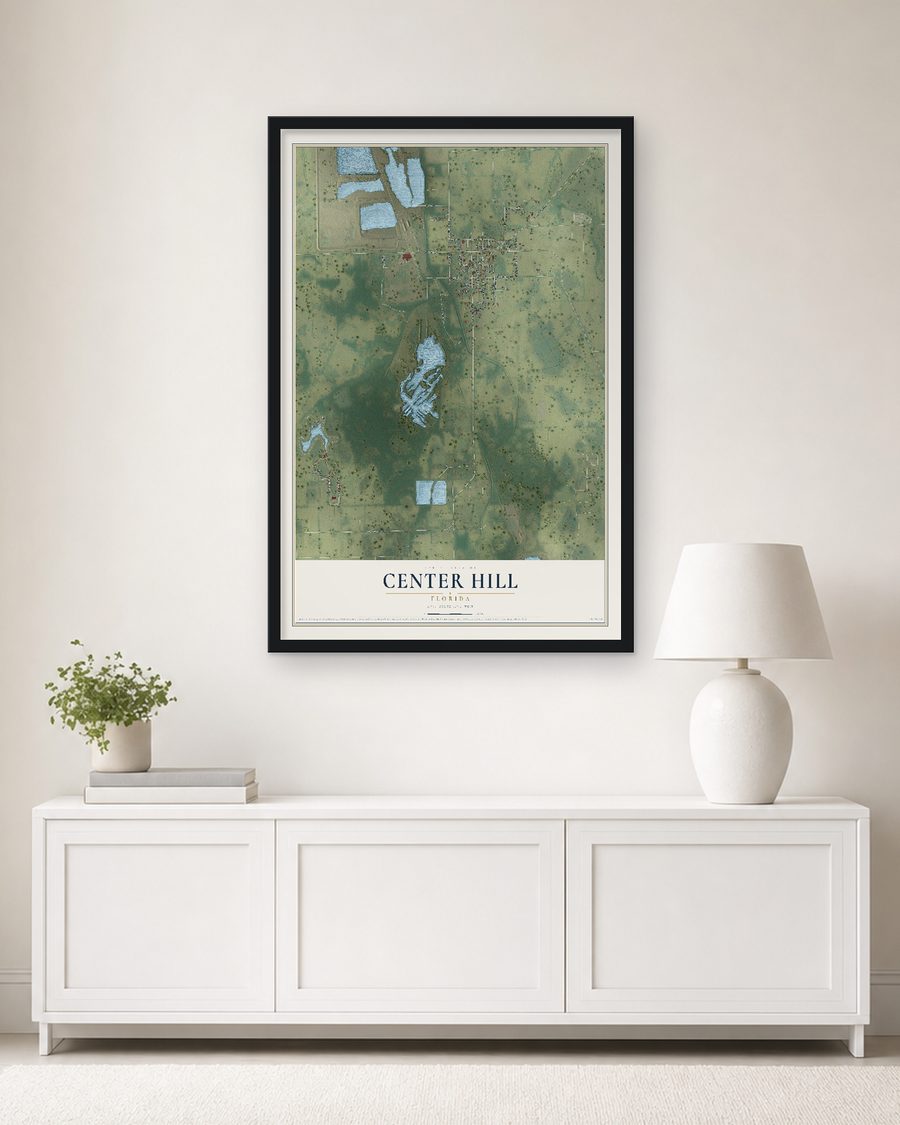 The Center Hill, Florida map, 24 x 36 in, in a black wood frame on a living room wall