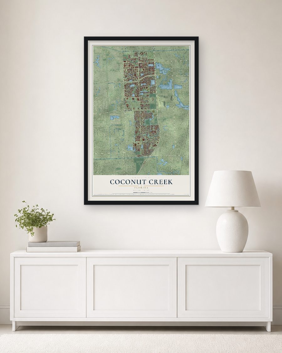 The Coconut Creek, Florida map, 24 x 36 in, in a black wood frame on a living room wall