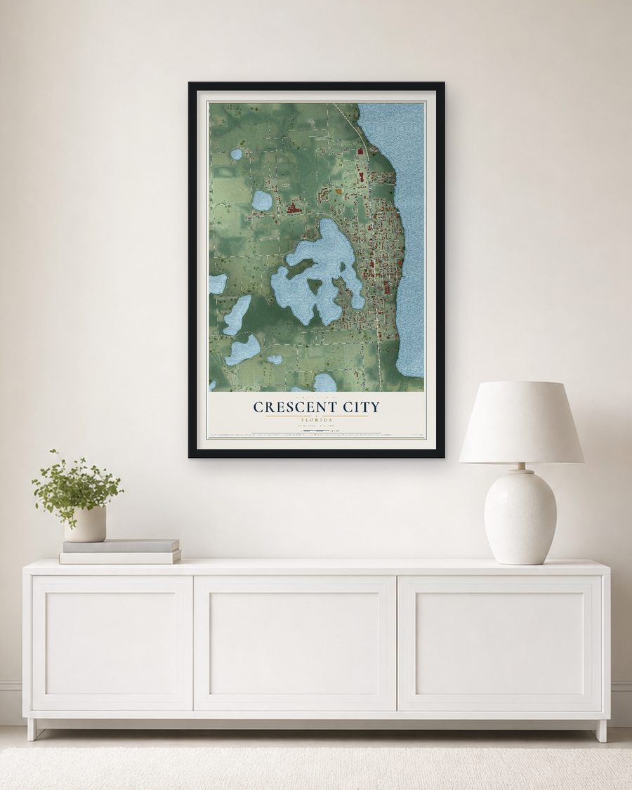 The Crescent City, Florida map, 24 x 36 in, in a black wood frame on a living room wall