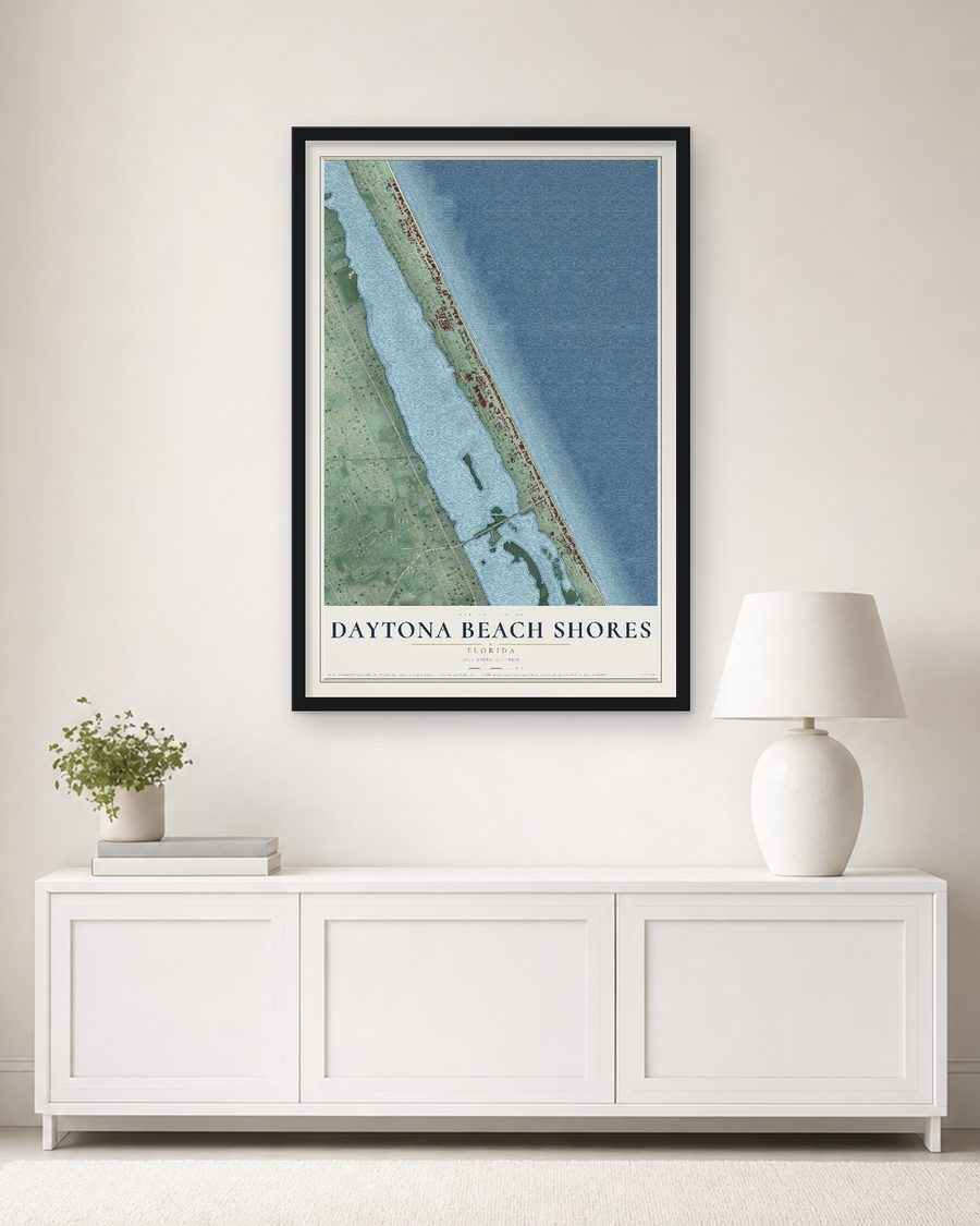 The Daytona Beach Shores, Florida map, 24 x 36 in, in a black wood frame on a living room wall