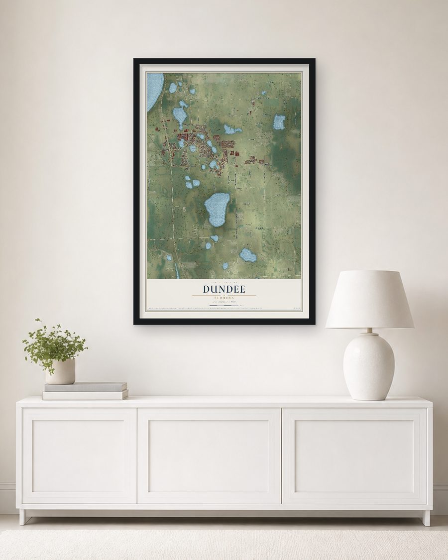 The Dundee, Florida map, 24 x 36 in, in a black wood frame on a living room wall