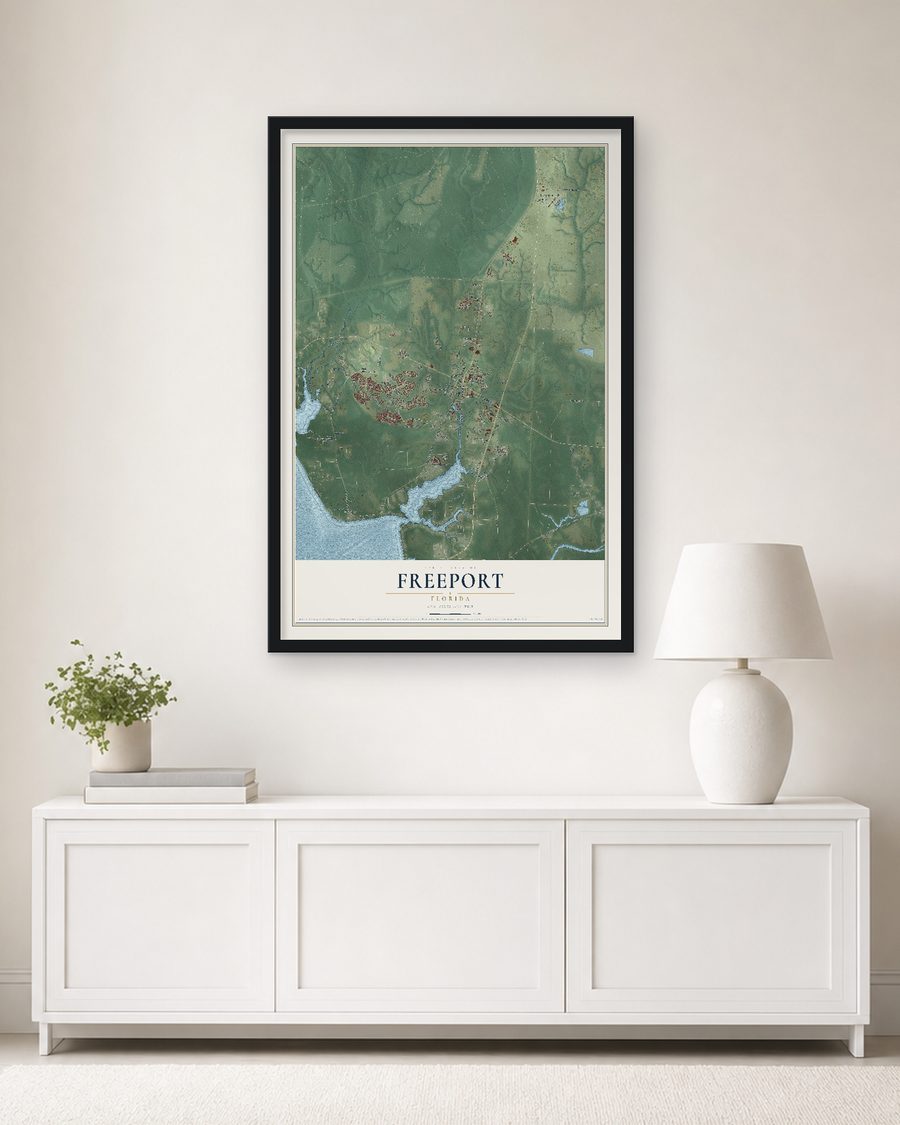 The Freeport, Florida map, 24 x 36 in, in a black wood frame on a living room wall