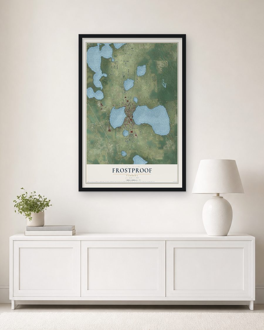 The Frostproof, Florida map, 24 x 36 in, in a black wood frame on a living room wall