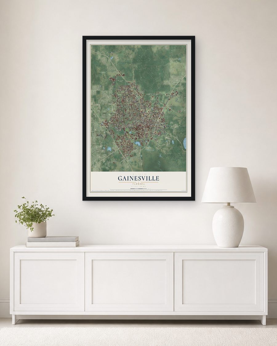 The Gainesville, Florida map, 24 x 36 in, in a black wood frame on a living room wall