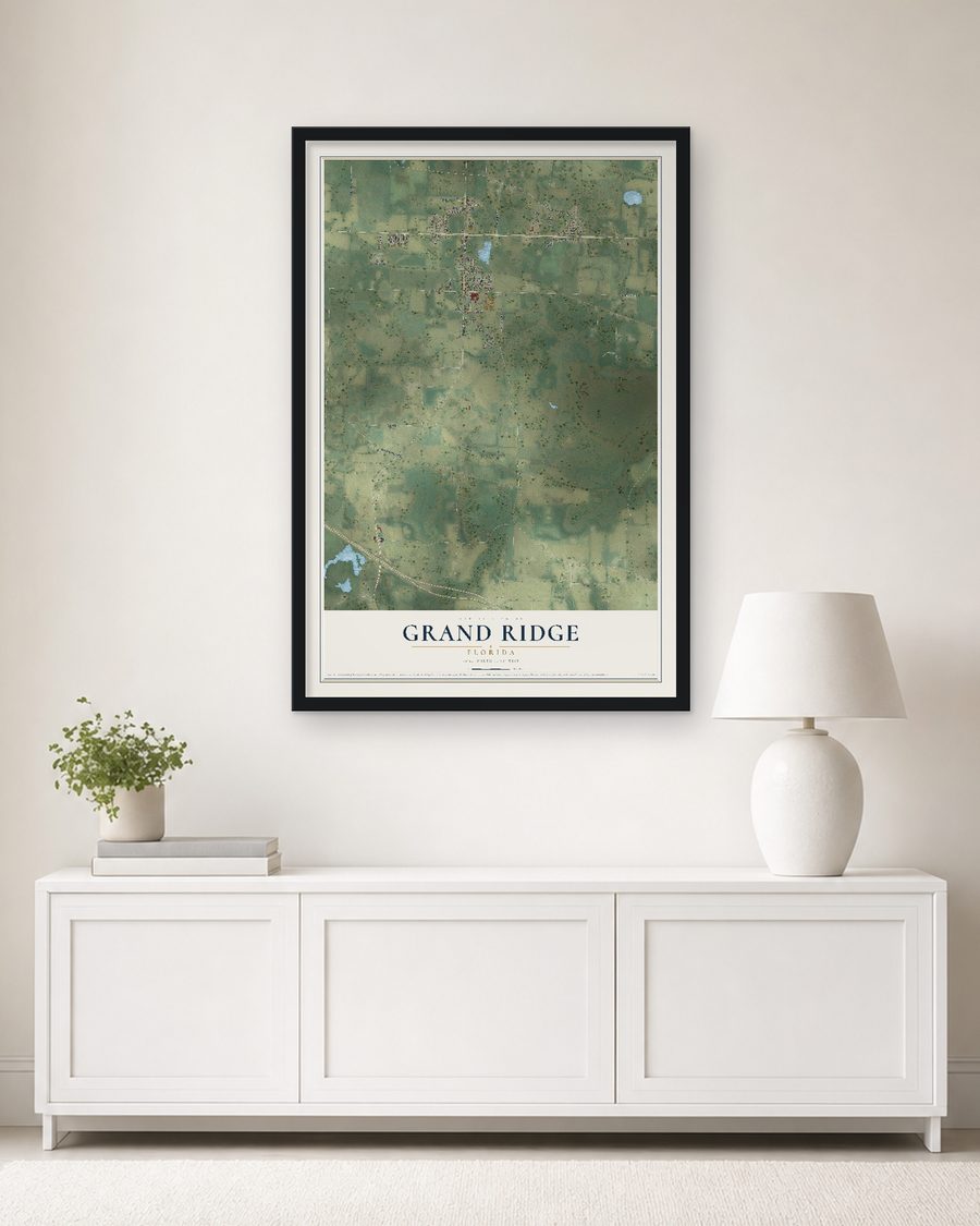 The Grand Ridge, Florida map, 24 x 36 in, in a black wood frame on a living room wall