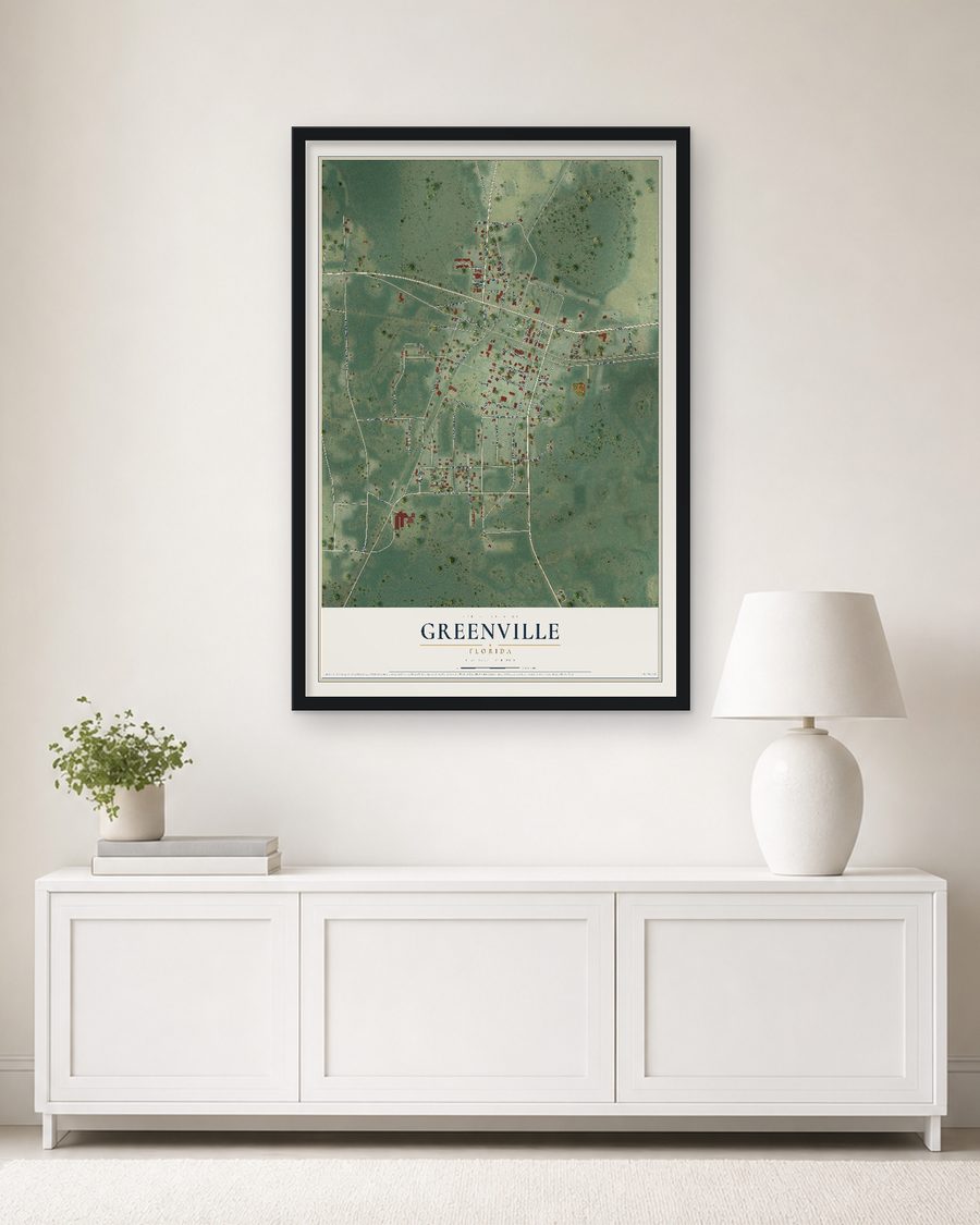 The Greenville, Florida map, 24 x 36 in, in a black wood frame on a living room wall