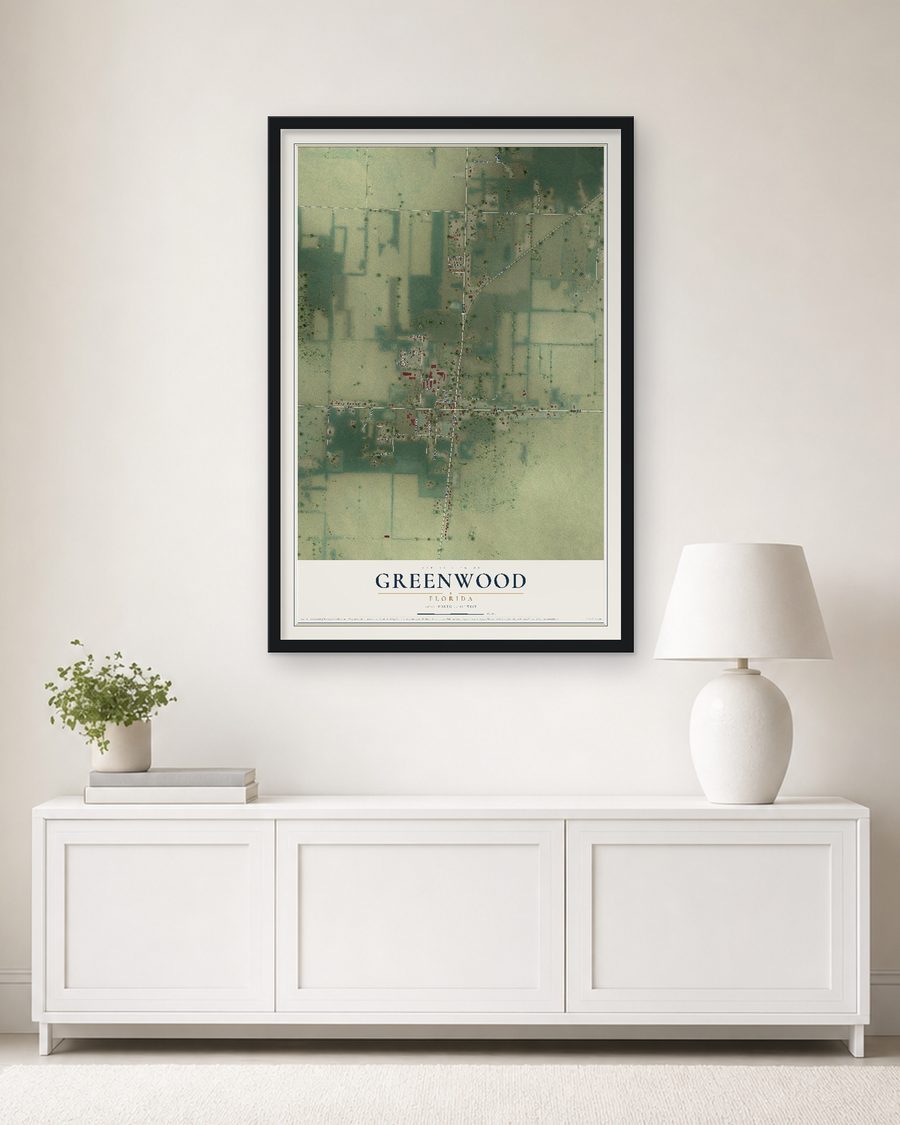 The Greenwood, Florida map, 24 x 36 in, in a black wood frame on a living room wall