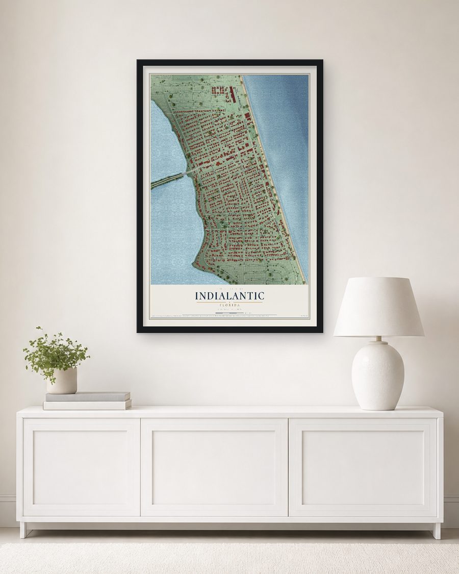 The Indialantic, Florida map, 24 x 36 in, in a black wood frame on a living room wall