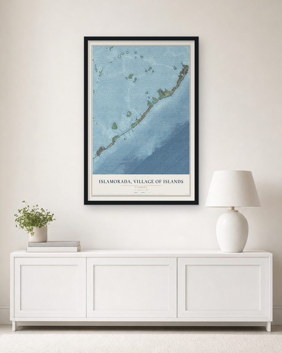 The Islamorada, Village of Islands, Florida map, 24 x 36 in, in a black wood frame on a living room wall