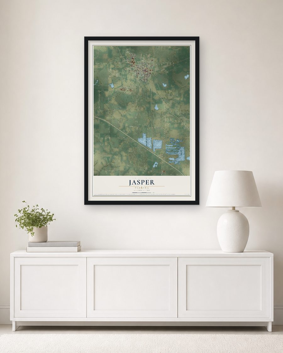 The Jasper, Florida map, 24 x 36 in, in a black wood frame on a living room wall
