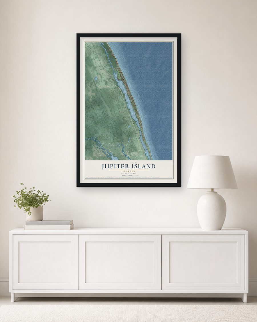 The Jupiter Island, Florida map, 24 x 36 in, in a black wood frame on a living room wall