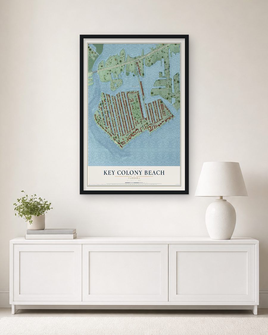 The Key Colony Beach, Florida map, 24 x 36 in, in a black wood frame on a living room wall