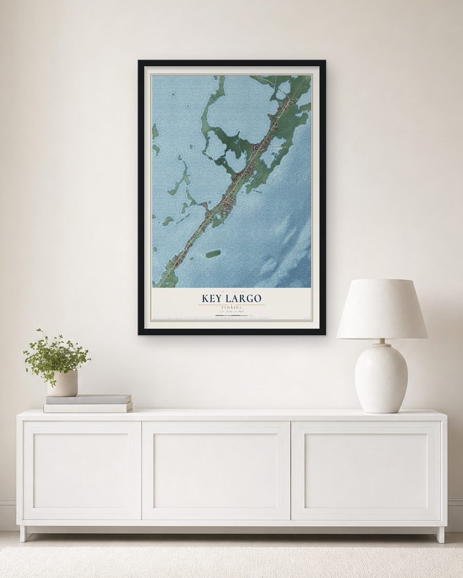 The Key Largo, Florida map, 24 x 36 in, in a black wood frame on a living room wall