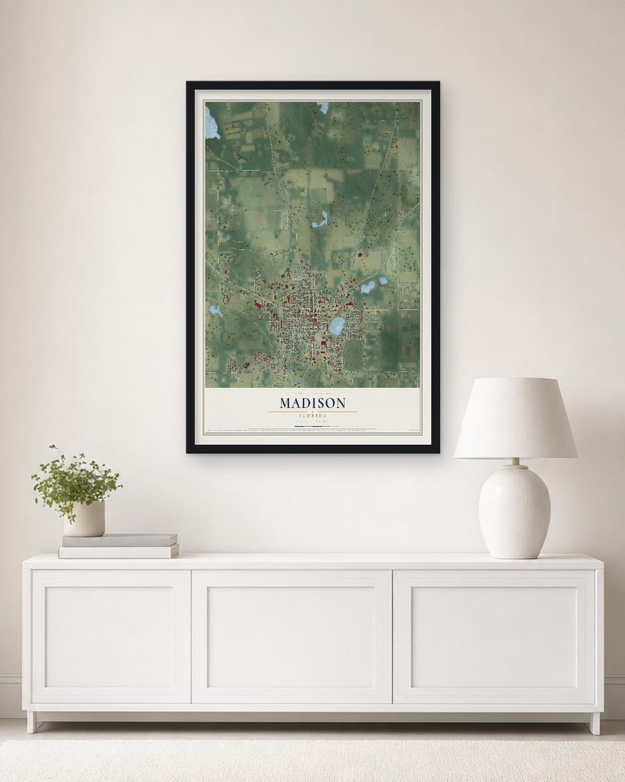 The Madison, Florida map, 24 x 36 in, in a black wood frame on a living room wall