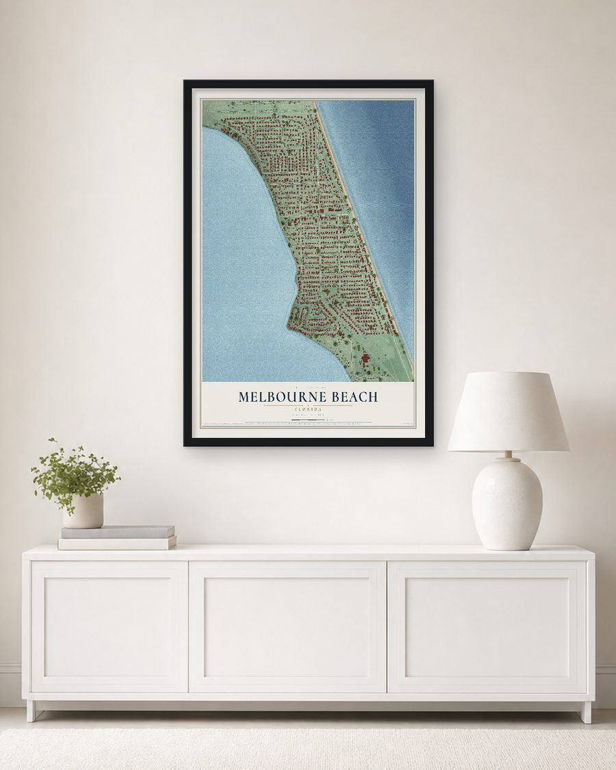 The Melbourne Beach, Florida map, 24 x 36 in, in a black wood frame on a living room wall