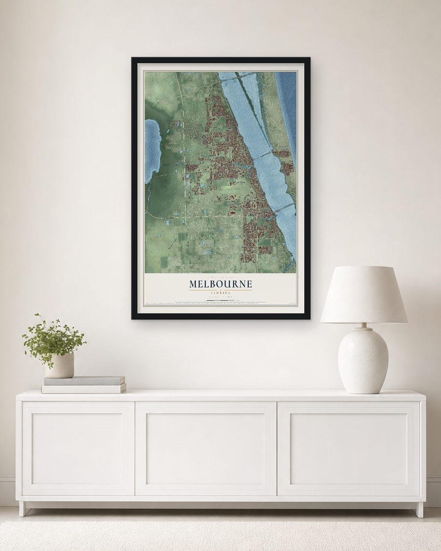The Melbourne, Florida map, 24 x 36 in, in a black wood frame on a living room wall