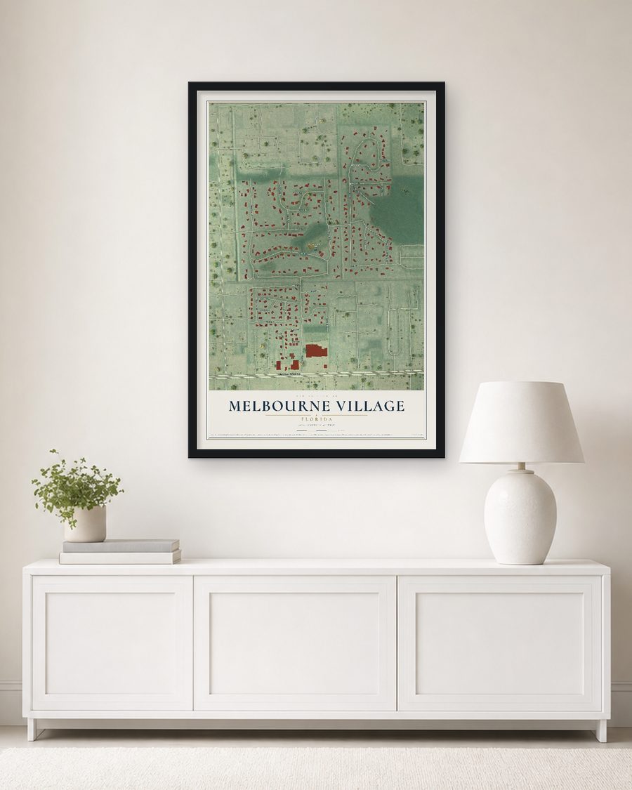 The Melbourne Village, Florida map, 24 x 36 in, in a black wood frame on a living room wall