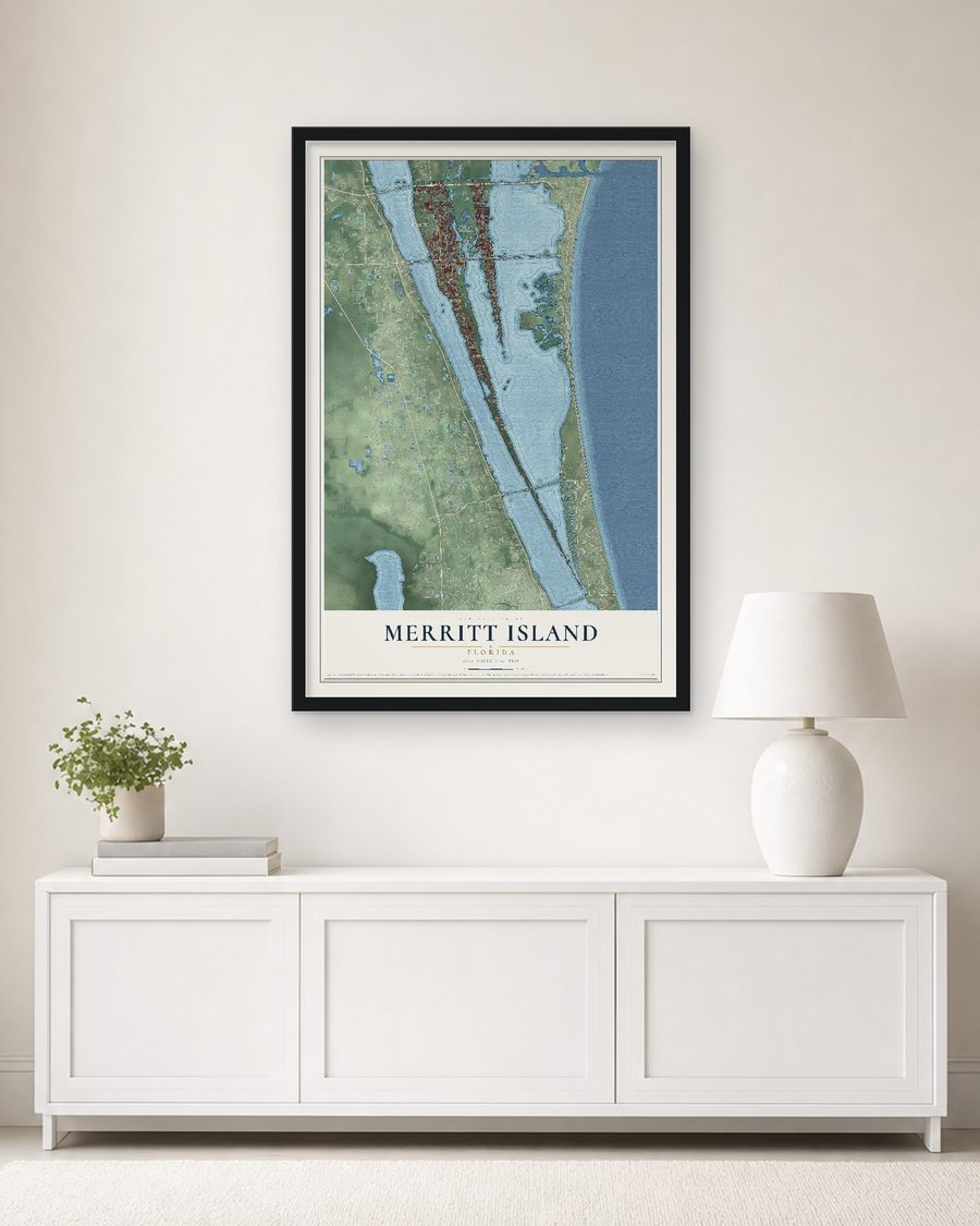 The Merritt Island, Florida map, 24 x 36 in, in a black wood frame on a living room wall