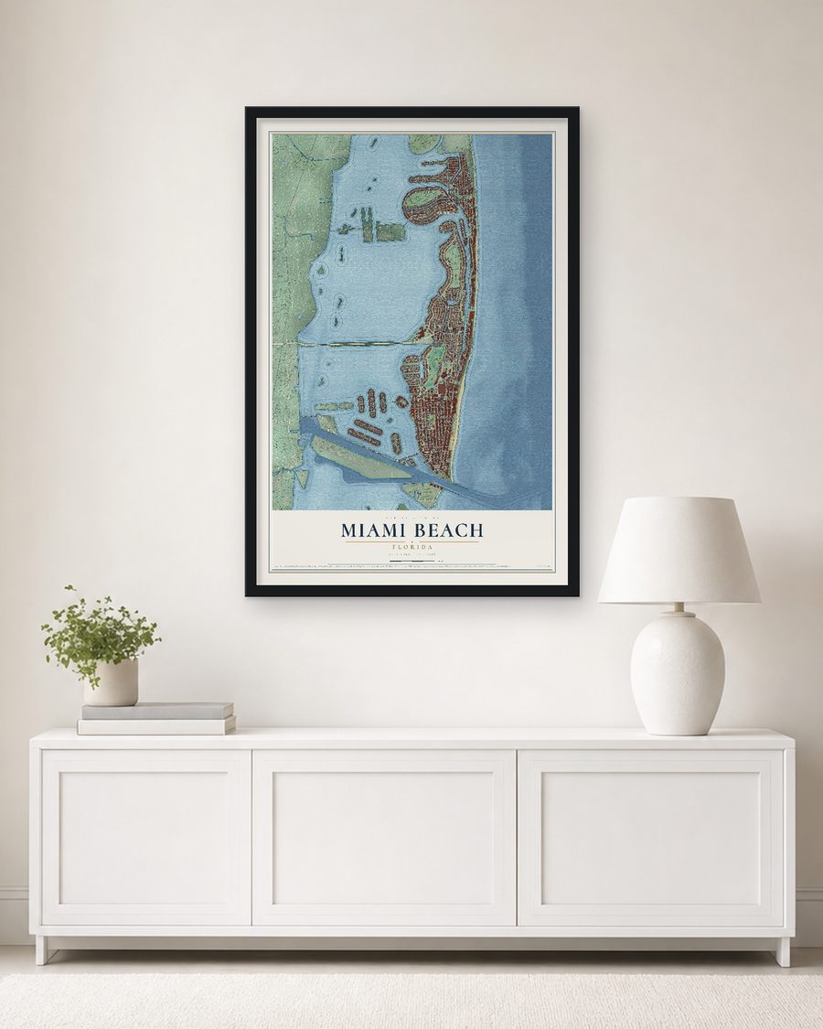 The Miami Beach, Florida map, 24 x 36 in, in a black wood frame on a living room wall
