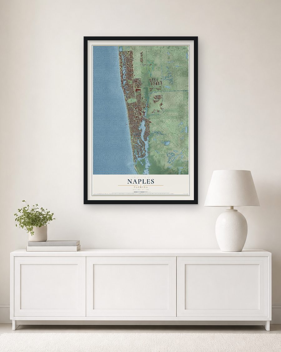 The Naples, Florida map, 24 x 36 in, in a black wood frame on a living room wall