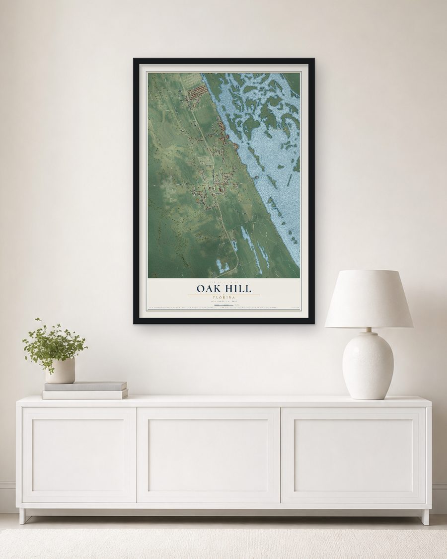 The Oak Hill, Florida map, 24 x 36 in, in a black wood frame on a living room wall