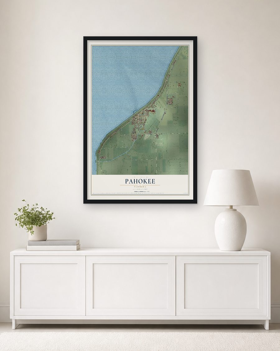 The Pahokee, Florida map, 24 x 36 in, in a black wood frame on a living room wall