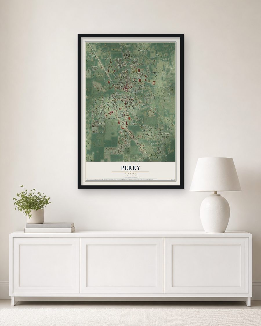 The Perry, Florida map, 24 x 36 in, in a black wood frame on a living room wall