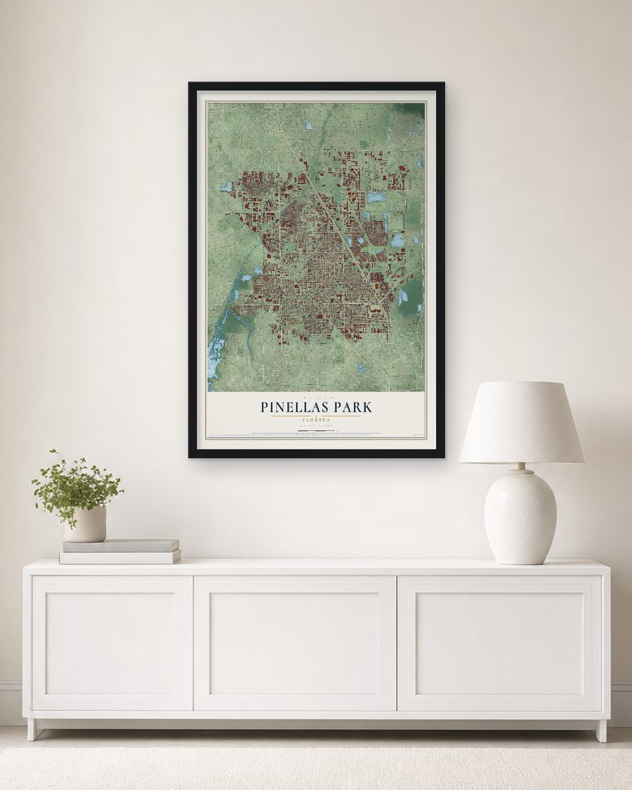 The Pinellas Park, Florida map, 24 x 36 in, in a black wood frame on a living room wall