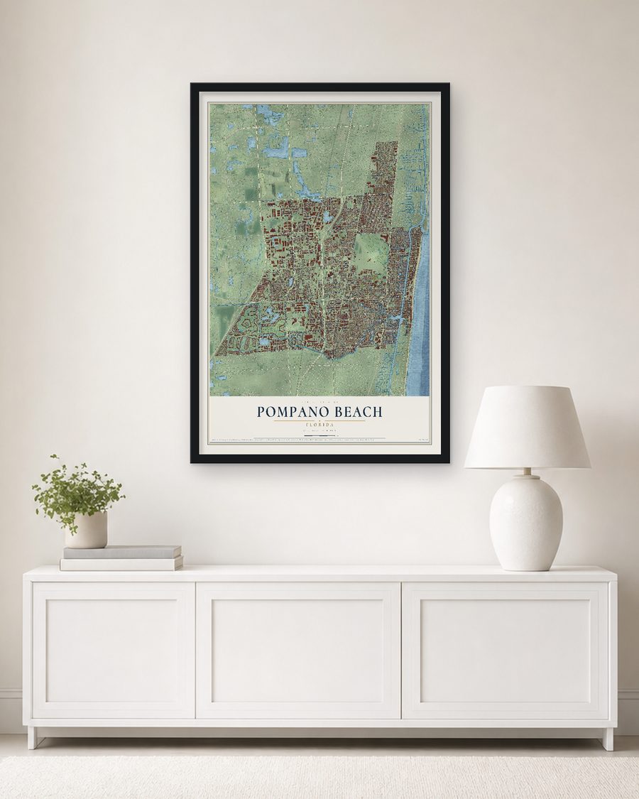 The Pompano Beach, Florida map, 24 x 36 in, in a black wood frame on a living room wall