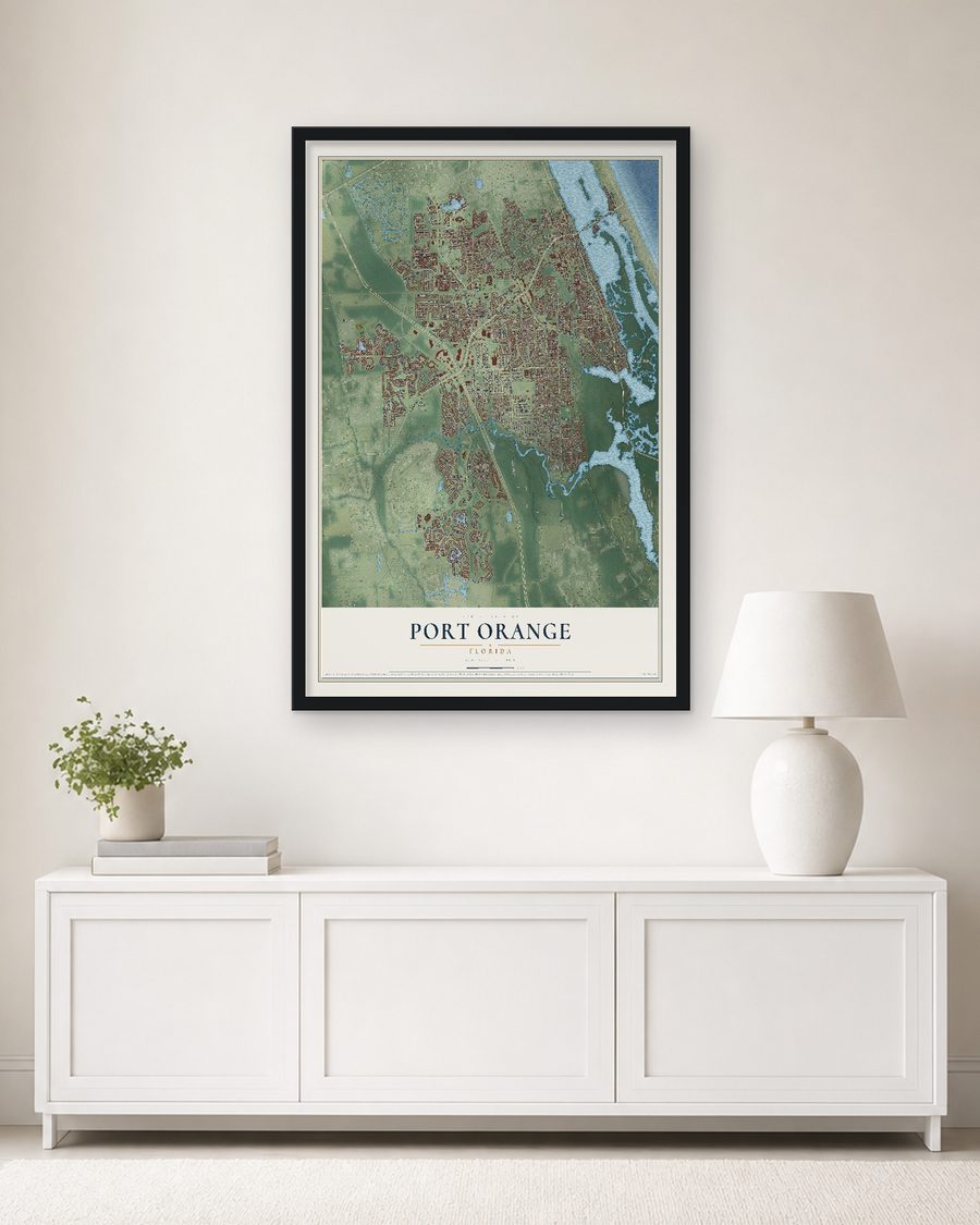 The Port Orange, Florida map, 24 x 36 in, in a black wood frame on a living room wall
