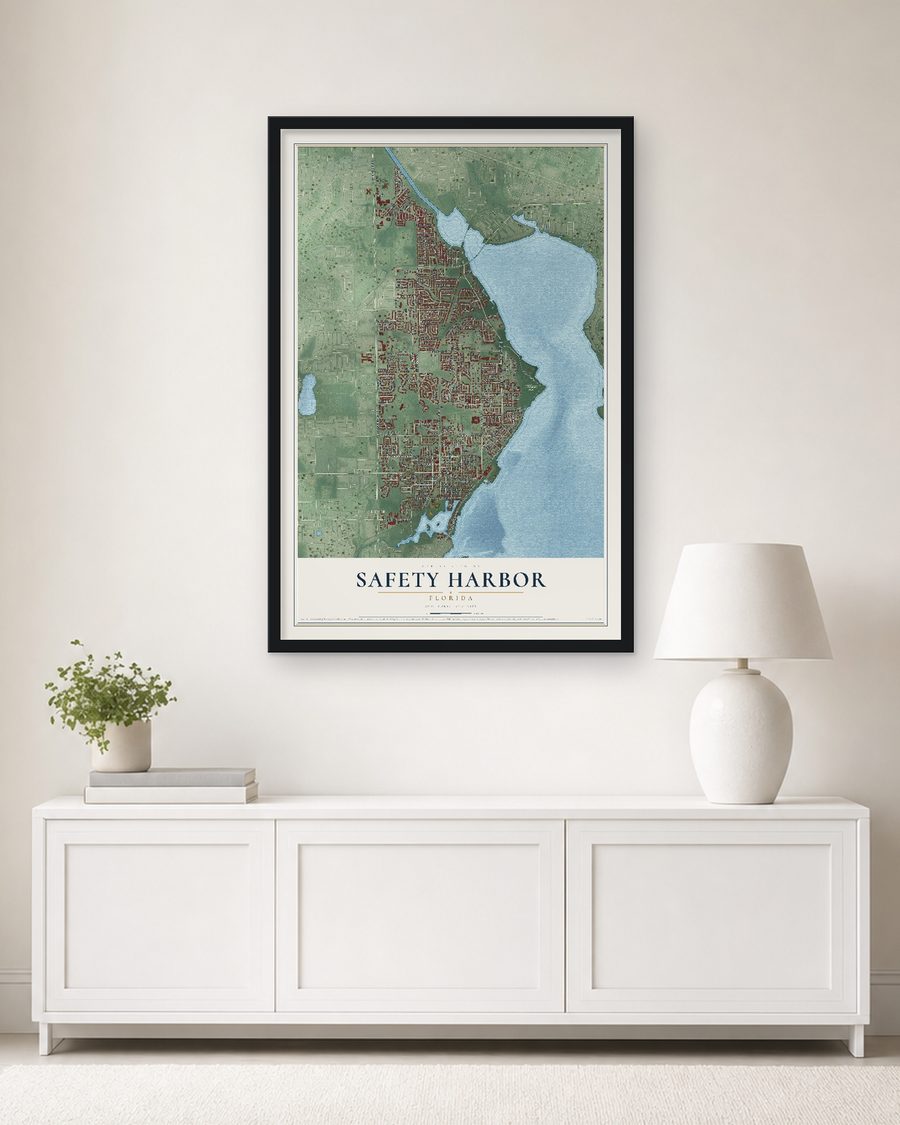The Safety Harbor, Florida map, 24 x 36 in, in a black wood frame on a living room wall
