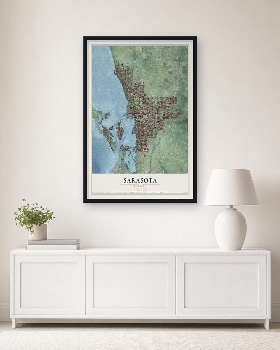 The Sarasota, Florida map, 24 x 36 in, in a black wood frame on a living room wall