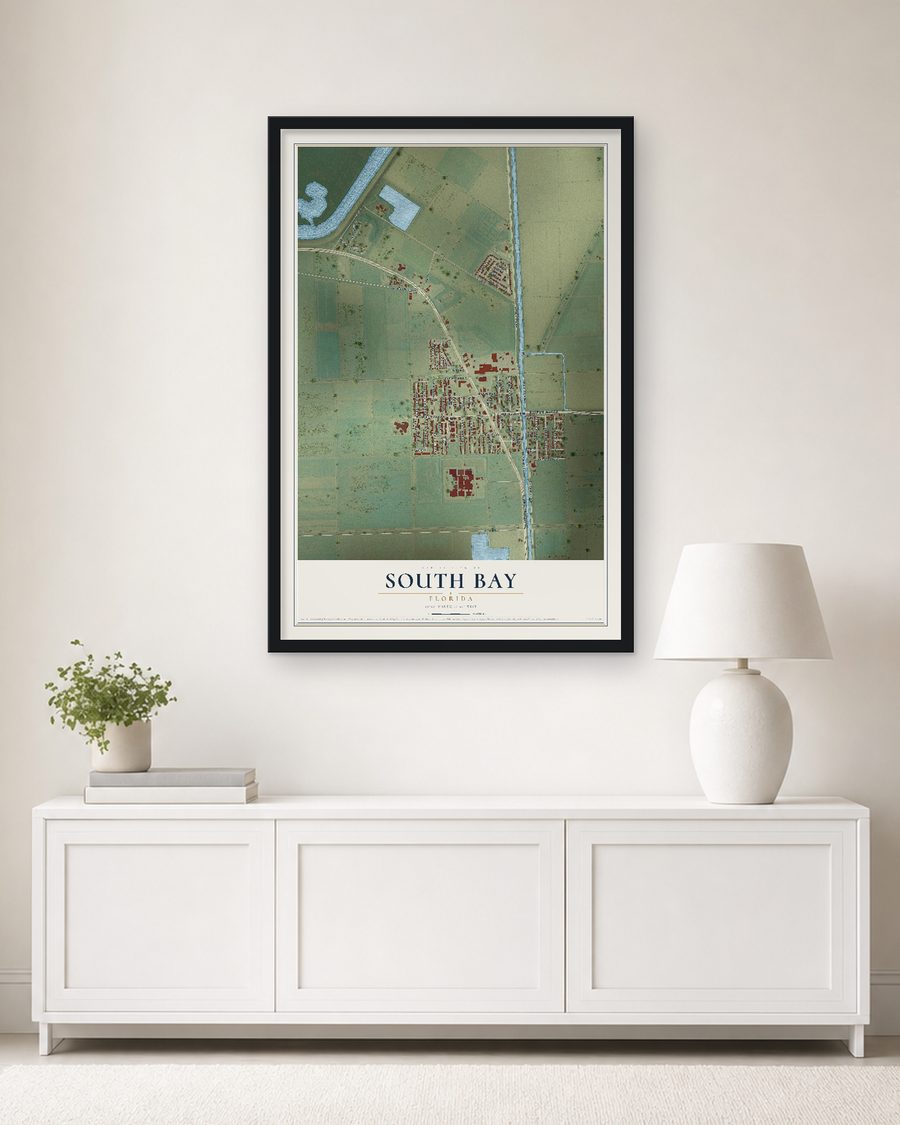 The South Bay, Florida map, 24 x 36 in, in a black wood frame on a living room wall