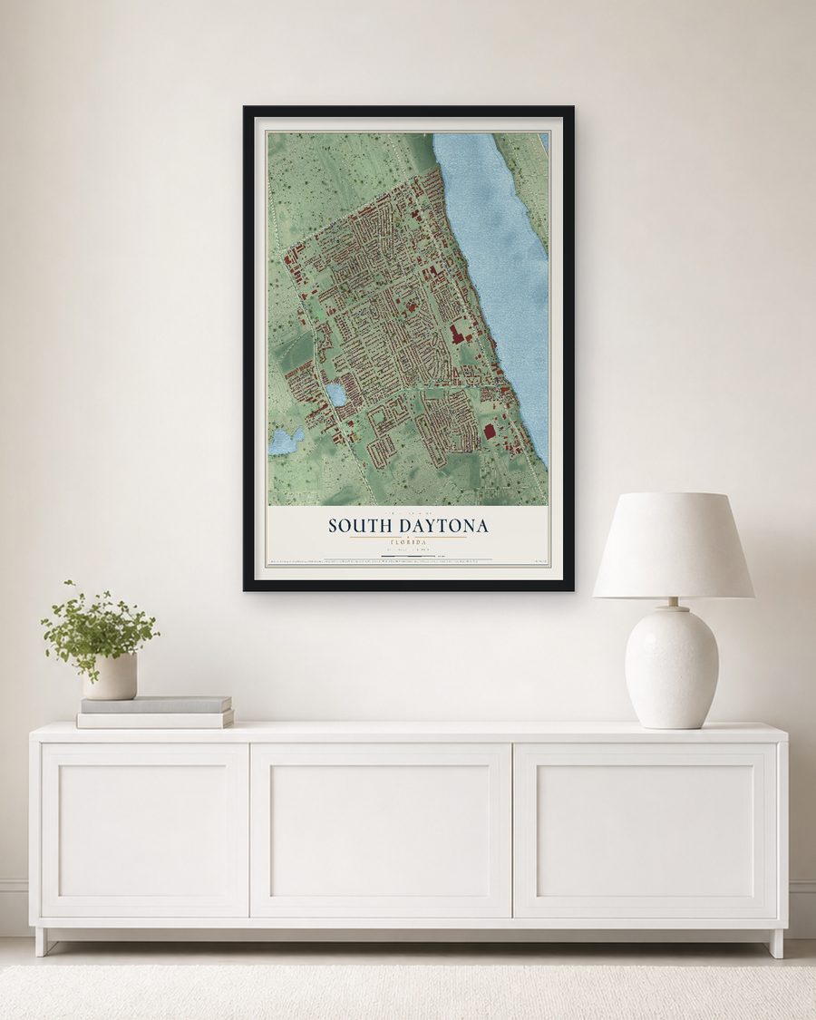 The South Daytona, Florida map, 24 x 36 in, in a black wood frame on a living room wall