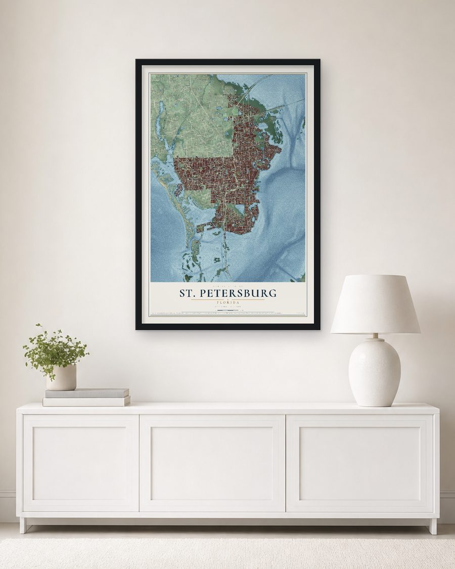 The St. Petersburg, Florida map, 24 x 36 in, in a black wood frame on a living room wall