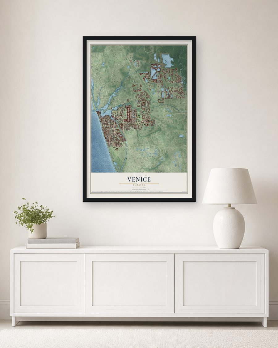 The Venice, Florida map, 24 x 36 in, in a black wood frame on a living room wall