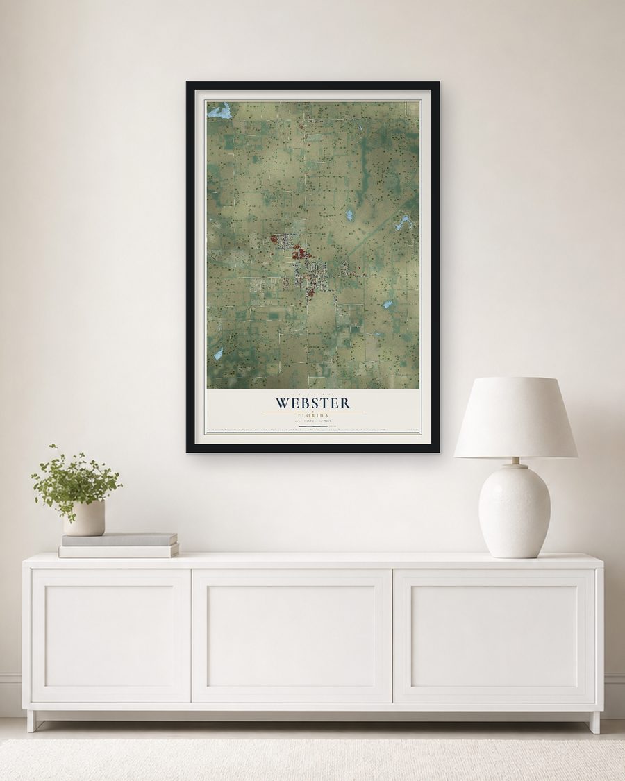 The Webster, Florida map, 24 x 36 in, in a black wood frame on a living room wall