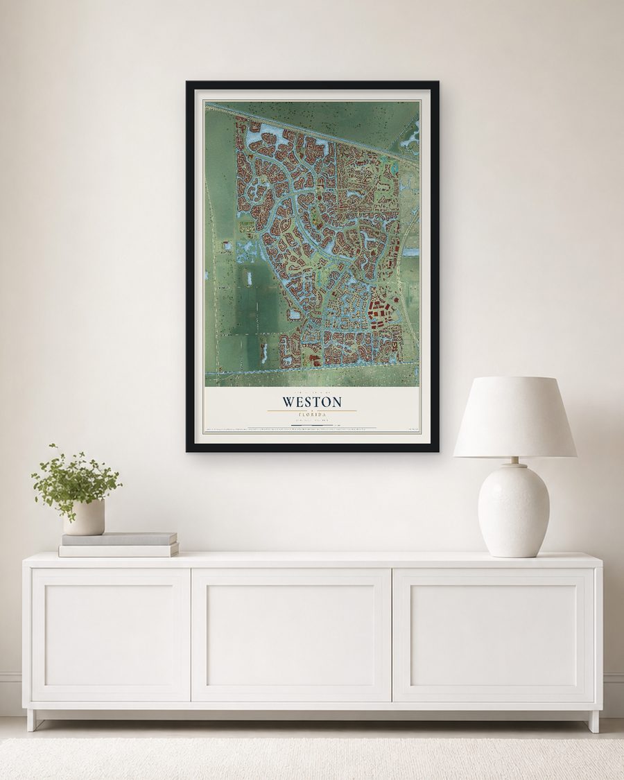 The Weston, Florida map, 24 x 36 in, in a black wood frame on a living room wall