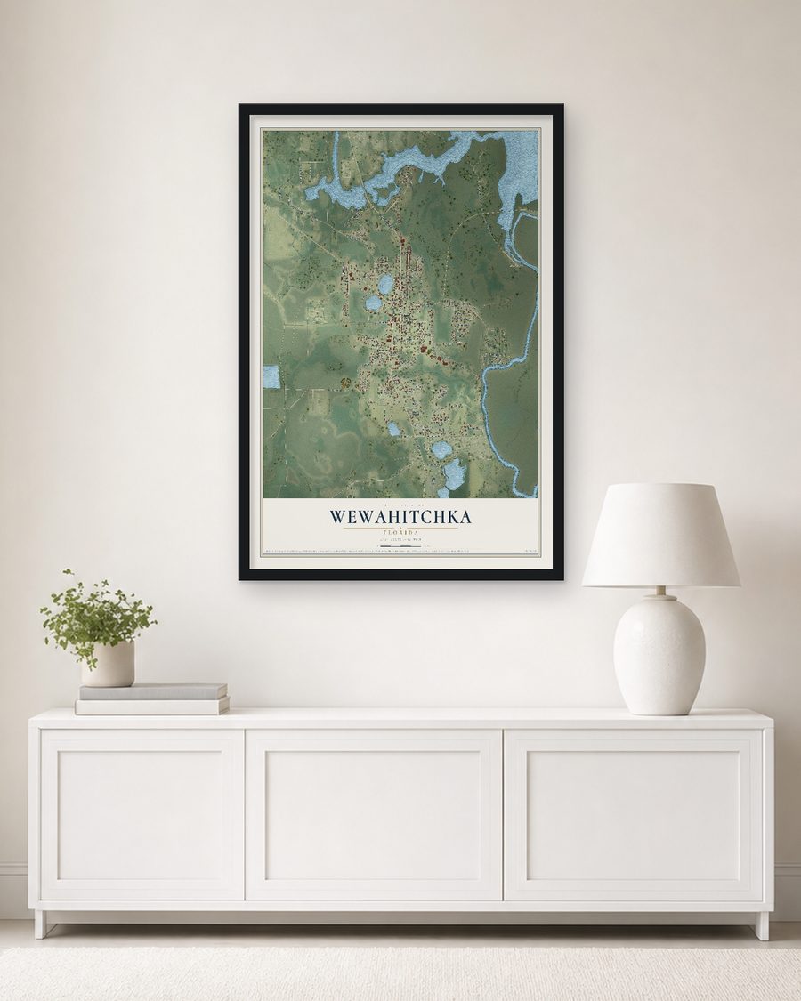 The Wewahitchka, Florida map, 24 x 36 in, in a black wood frame on a living room wall